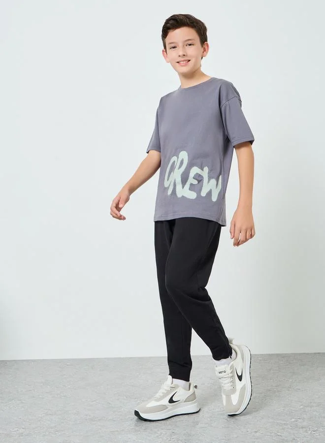 ستايلي بنطال جوغر أولادي أسود مطبع برباط